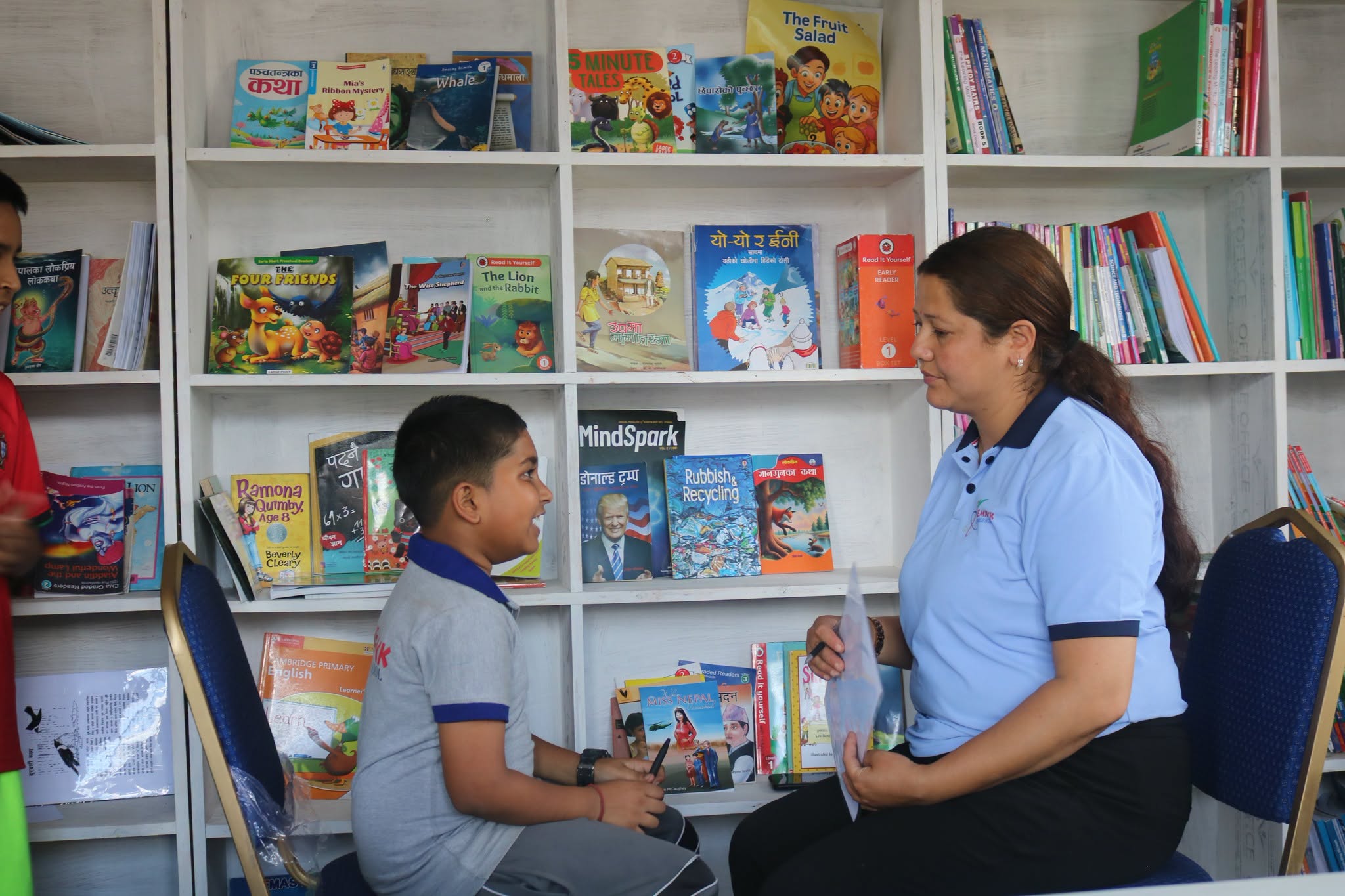 Students reading inside the school library